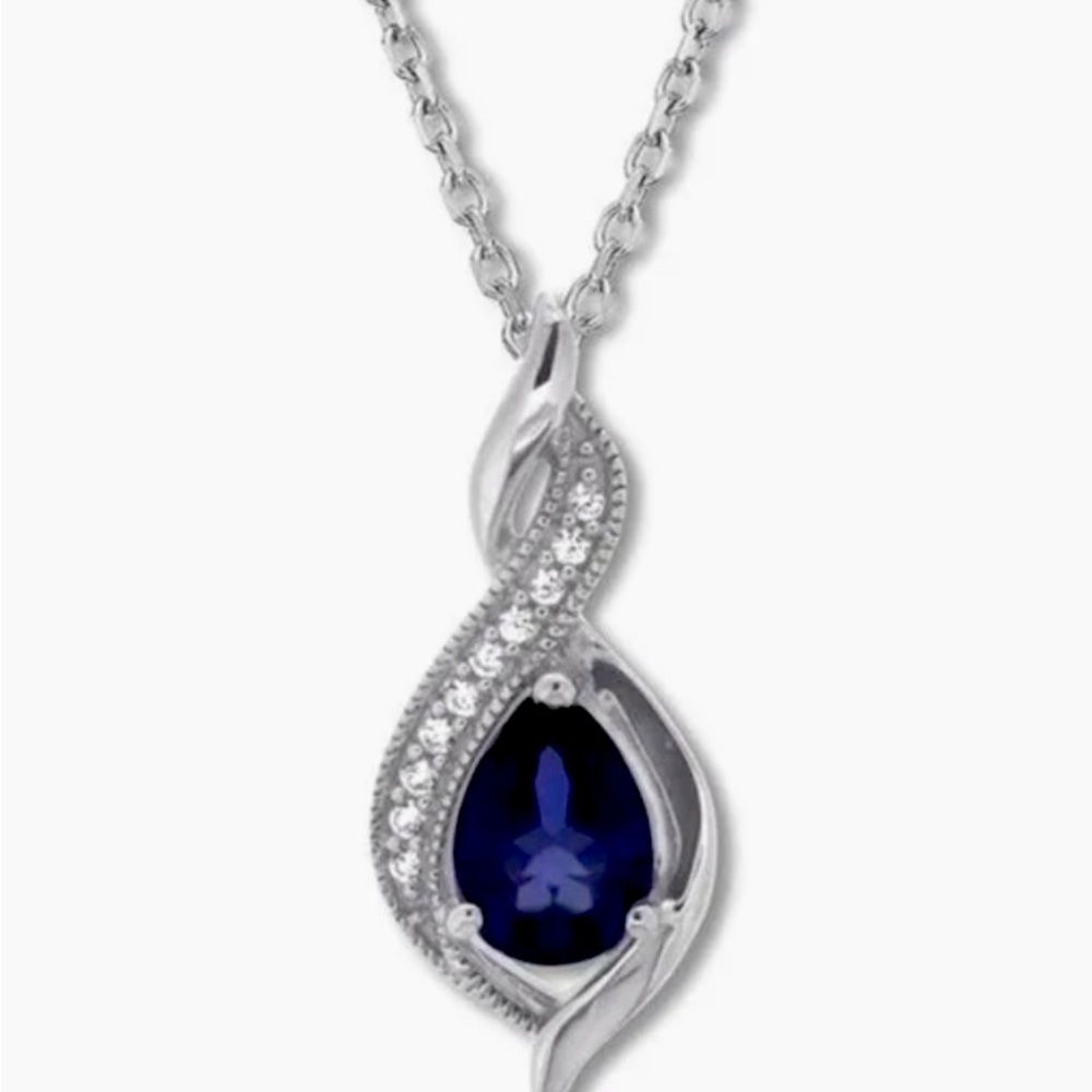 Sterling silver necklace and earrings. Sapphire and diamonds. Never worn.